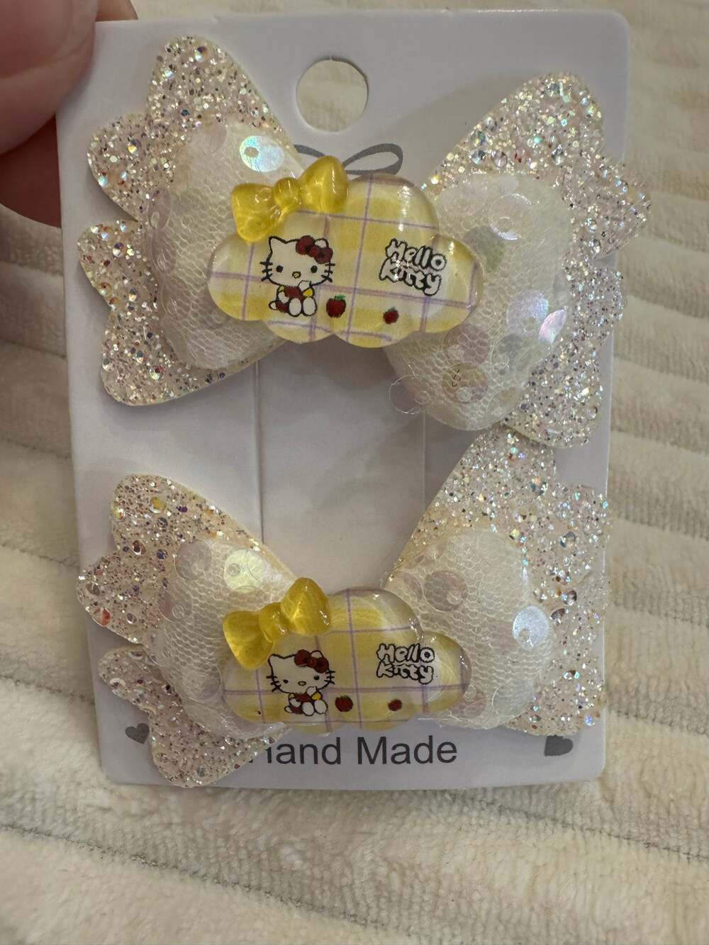 Hello Kitty yellow and white sparkles bow hair clips glittery wings set of 2